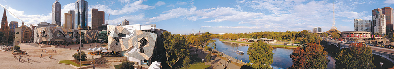 A wide shot oversee the riverbank in Melbourne CBD